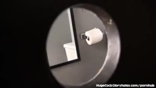 Sunny Lane sucks a dick through a gloryhole