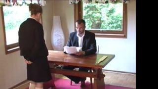 A schoolgirl is getting spanked by her headmaster