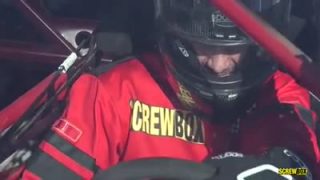 Racer girl drives a cock into her ass