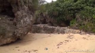 Japanese babes sucking dick at the beach